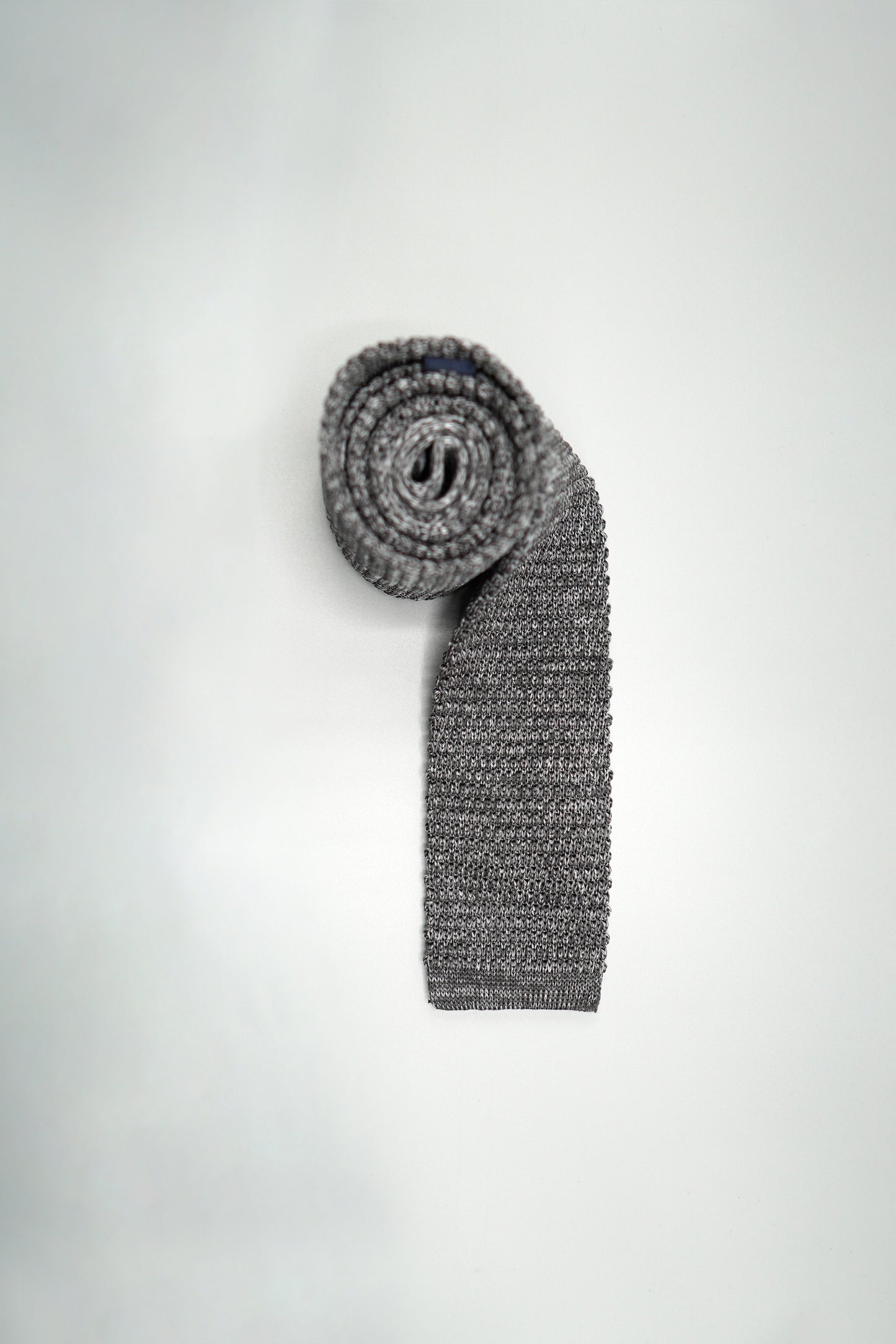 the manhattan silk knit tie rolled