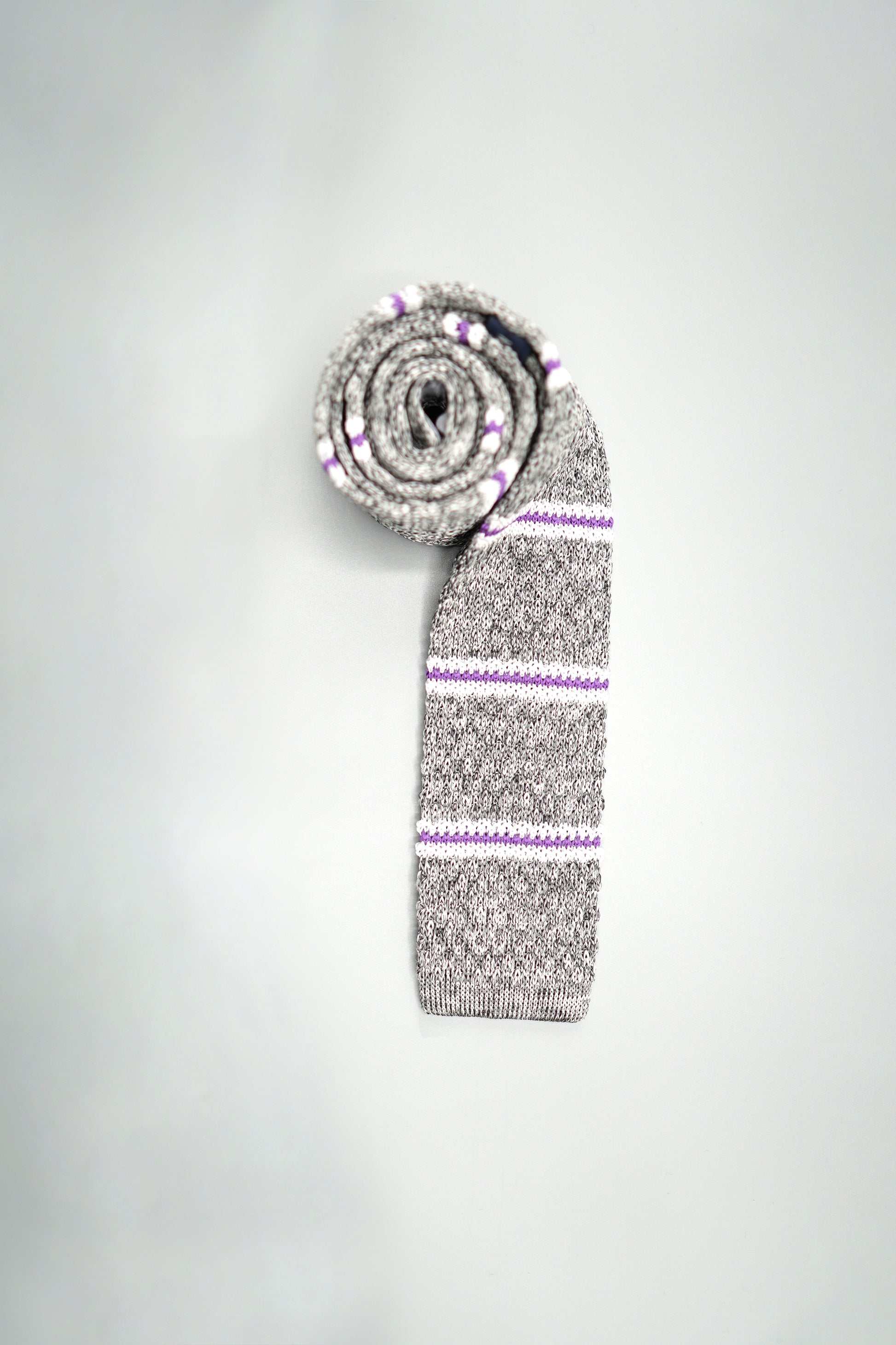 the queenstown silk knit tie rolled